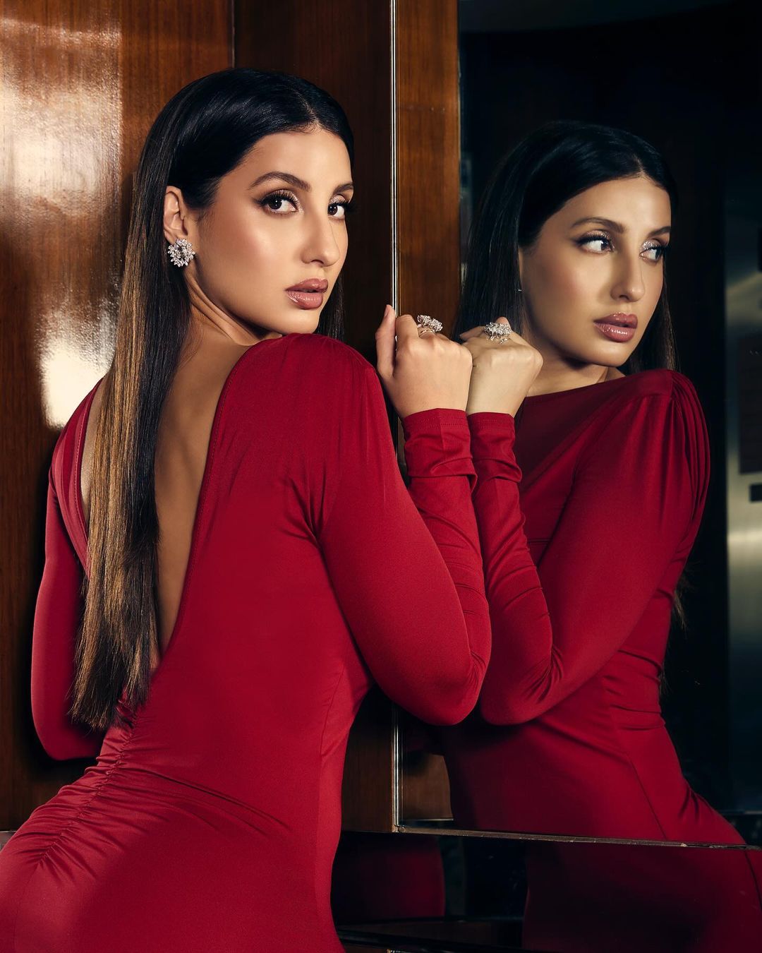 Nora Fatehi looks party ready for the season in a stunning red bodycon gown (6)